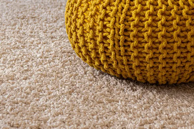 small pillow on carpet